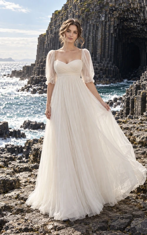 Vestido de novia vintage de corte A con escote corazón, tul, mangas cortas y cola larga.