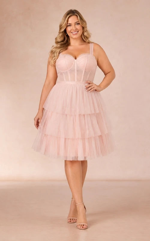 Robe de bal grande taille en tulle rose poudré, coupe trapèze, longueur genou, bustier cœur, corset à volants