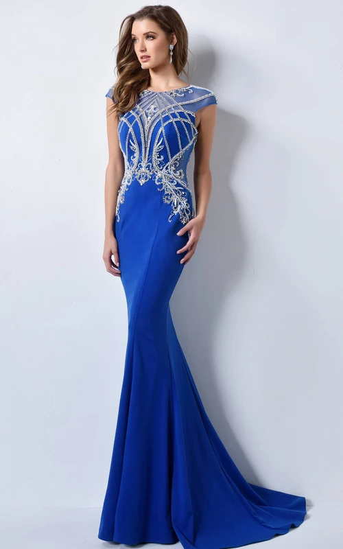 Vestido tubo de punto con escote redondo, mangas cortas y efecto ilusión con abalorios.
