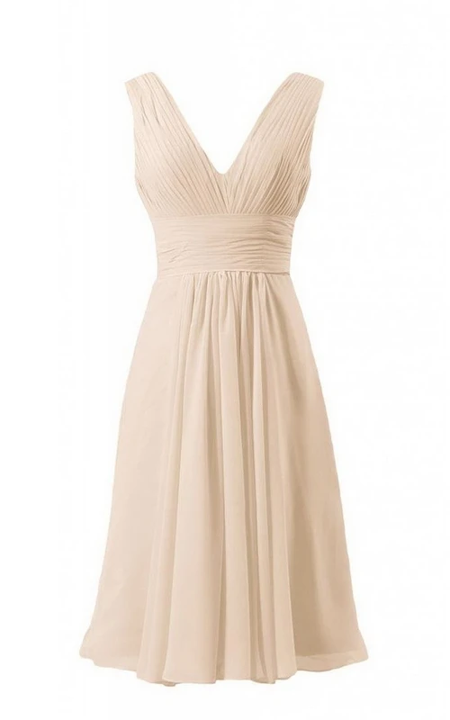 Robe courte empire sans manches en mousseline à col en V