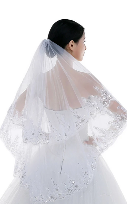 Voile de mariée en tulle à paillettes, arrivant au bout des doigts