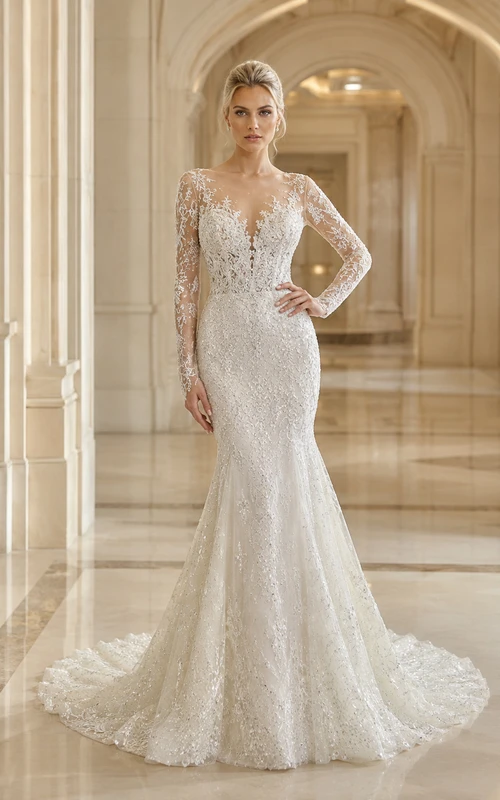 Robe de mariée sirène en dentelle harmonieuse, décolleté en V profond, manches longues, traîne chapelle, applications florales, idéale pour un mariage à destination.