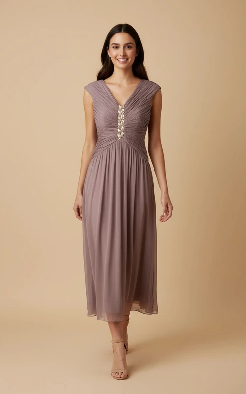 Robe de soirée élégante en mousseline perlée