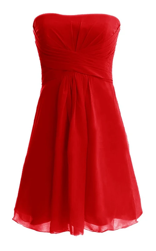 Vestido tipo corsé sin tirantes con cremallera en la espalda.