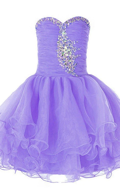 Robe trapèze à volants et sequins