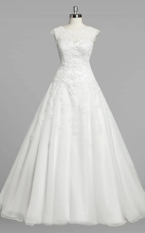 Robe de mariée en organza, coupe trapèze, manches courtes et col rond, avec corsage en dentelle