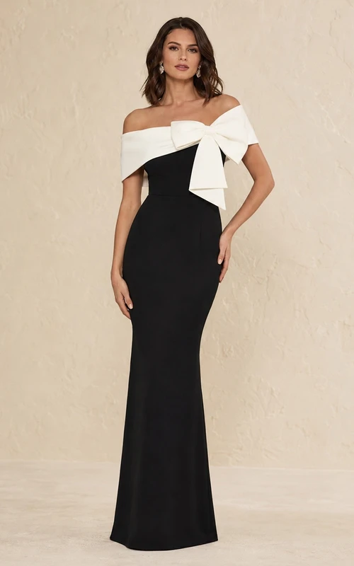 Elegante vestido de noche formal largo hasta el suelo, negro y blanco, con escote Bardot y corte recto.