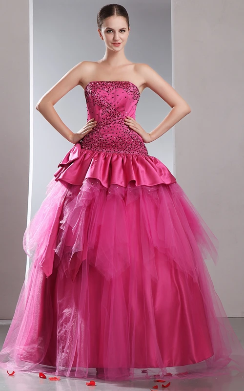 Trägerloses A-Linien-Ballkleid mit Pailletten und Schößchen