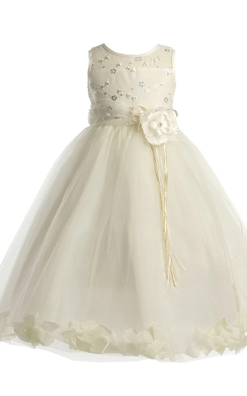 Robe trapèze sans manches ornée d'appliqués floraux et de plis