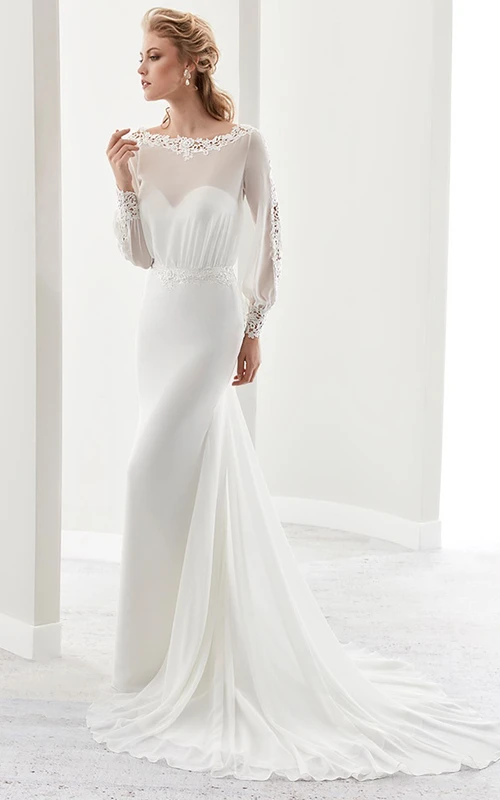 Vestido tubo de manga larga con escote joya, diseño ilusión y espalda con abertura.