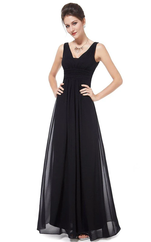 Vestido de gasa sin mangas con corte en A y espalda baja en V.