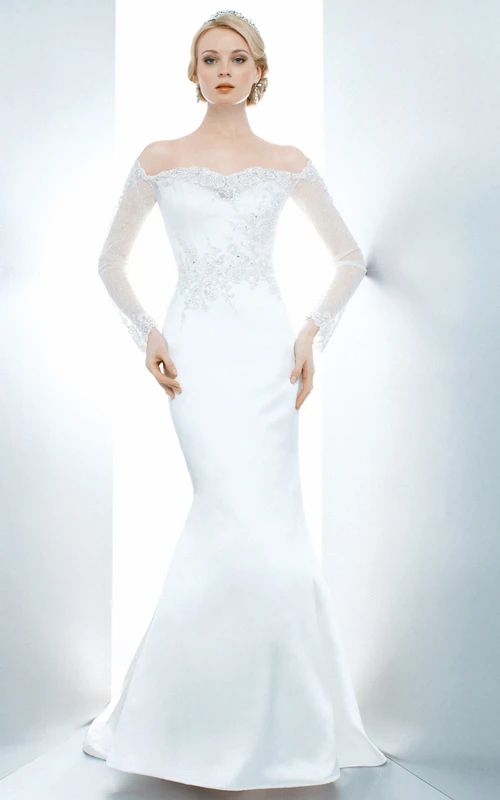 Vestido de novia de satén con mangas ilusión y apliques de sirena