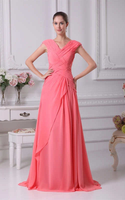 Vestido largo con escote en V, mangas cruzadas y espalda tipo corsé con pliegues.