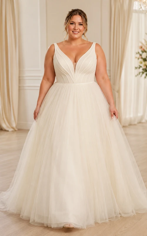 Robe de mariée longue en tulle, coupe trapèze, décolleté en V profond et bretelles larges, grande taille.