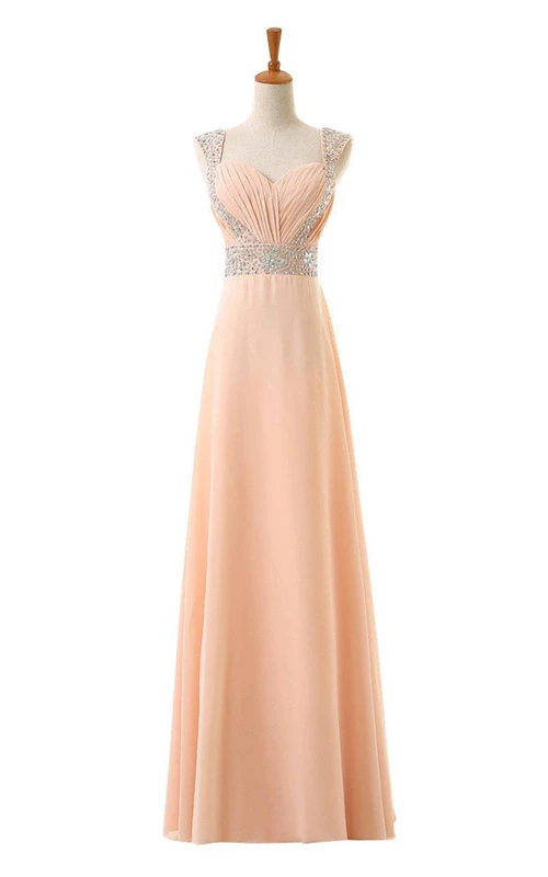 Robe trapèze en mousseline à manches courtes et épaules ornées de sequins