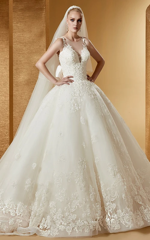 Feminine Cap Sleeve Ball Gown With Illusive Neckline And Back Bow