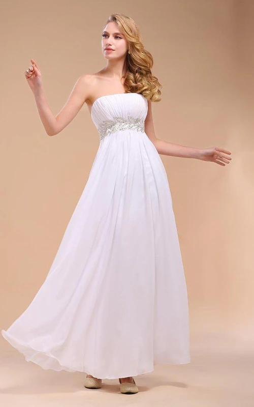 Robe bustier en mousseline avec taille empire et appliques