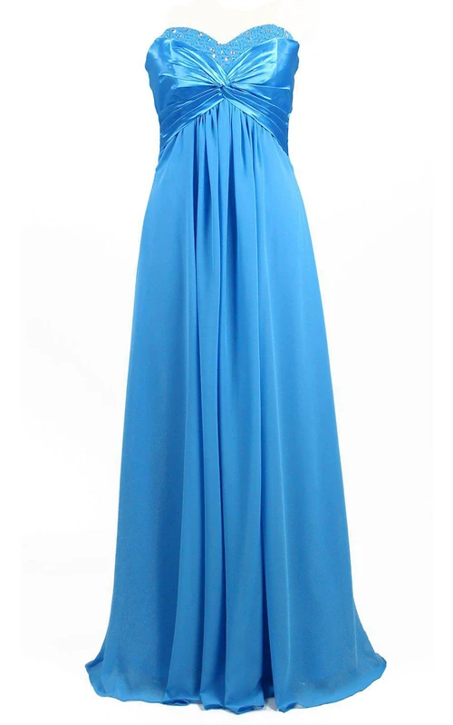 Robe en mousseline de soie à décolleté en cœur style empire, ornée de perles