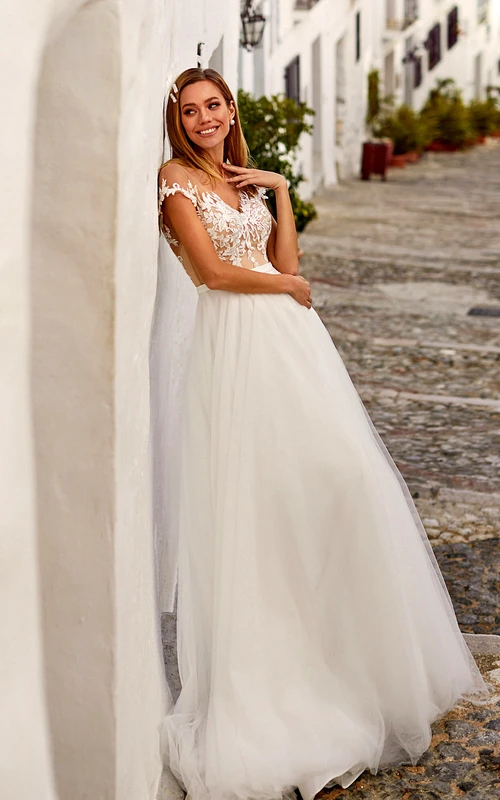 Vestido de novia de gasa con escote en V y corte imperio en línea A