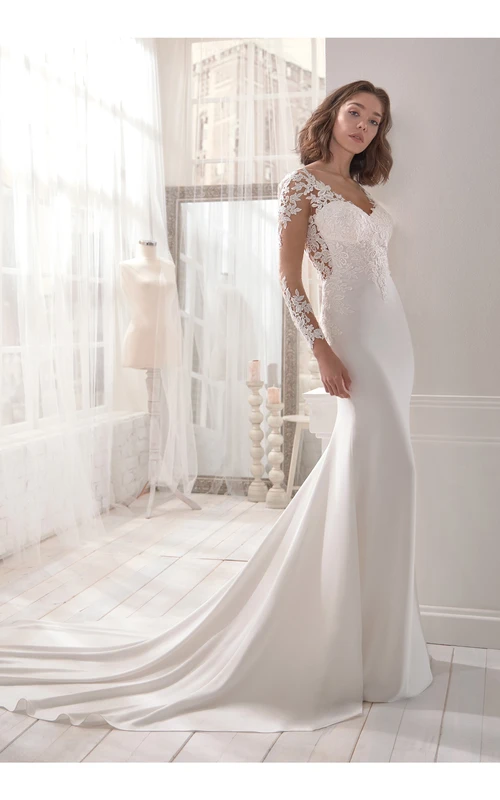 Encantador vestido de novia de manga larga con escote en V y espalda ilusión.