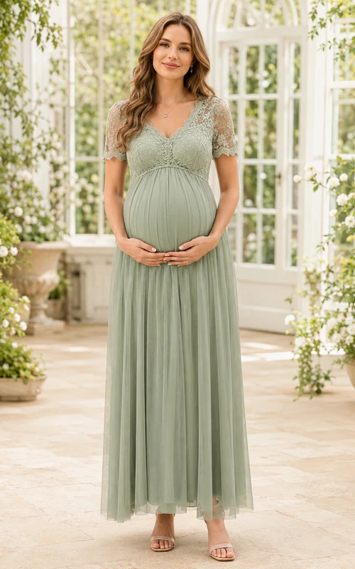 Vestido de maternidad estilo imperio hasta el tobillo con escote en V, encaje y mangas cortas de tul color verde salvia.