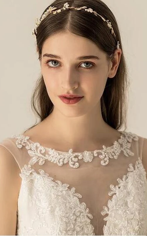 Elegante goldene Haarbänder mit Blumen und Blättern