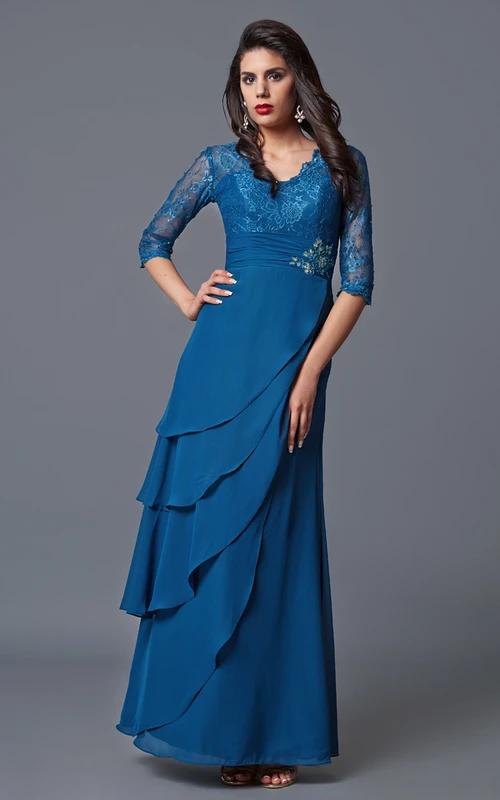 Robe de soirée longue élégante à manches longues et col en V, en dentelle et mousseline superposées.