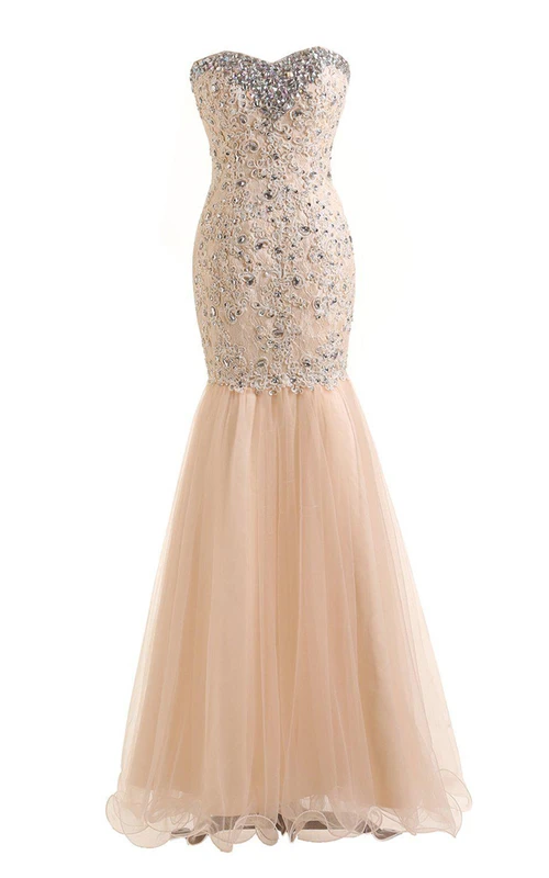 Vestido de novia estilo trompeta con apliques y abalorios.