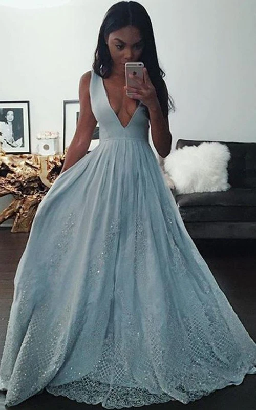 Vestido sin mangas con escote en V, cremallera y espalda baja en V, corte en A, de satén y encaje.