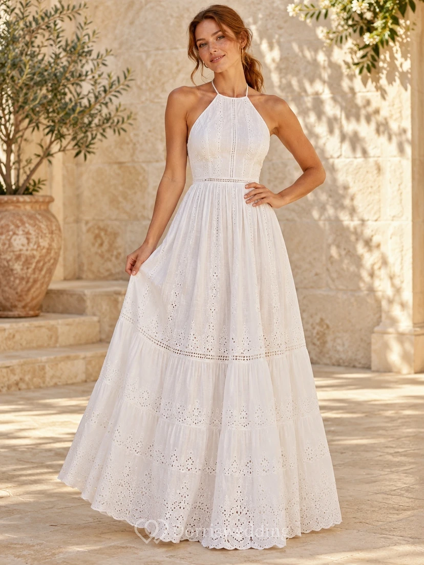 Robe longue bohème blanche dos nu en dentelle ajourée à volants et longueur cheville