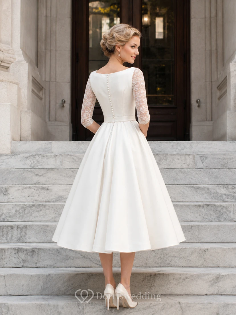 Vestido de novia de estilo vintage de los años 50 con mangas de encaje y largo hasta la rodilla, estilo juzgado. view 2