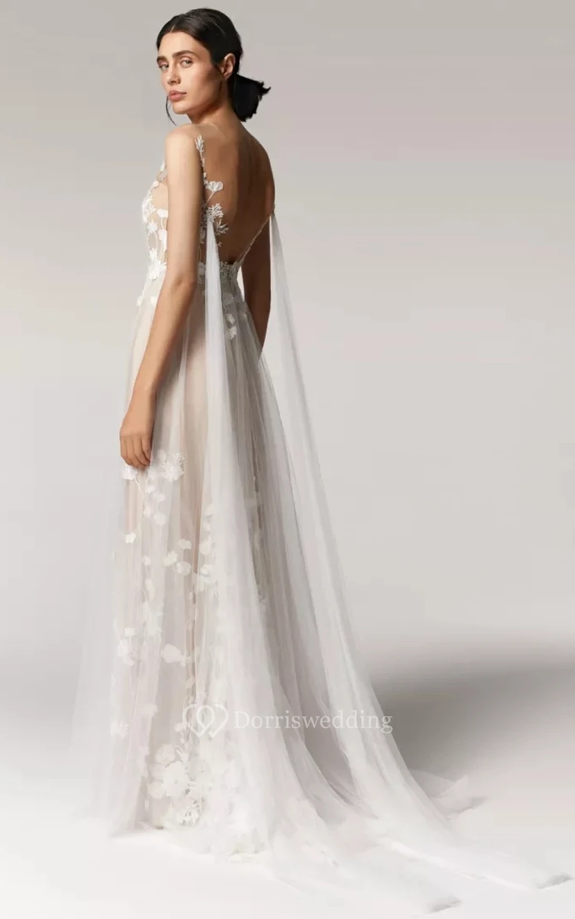 Robe de mariée vaporeuse sans manches en tulle, plissée empire et ornée d'appliqués de dentelle. view 2