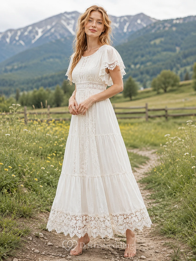 Vestido de novia estilo bohemio con cuello joya, volantes y encaje, largo hasta la rodilla, color pradera.