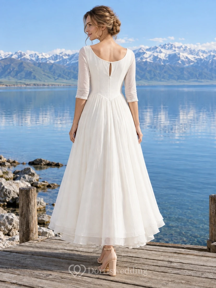 Vestido de novia sencillo de corte A con escote redondo y mangas tres cuartos hasta los tobillos view 2