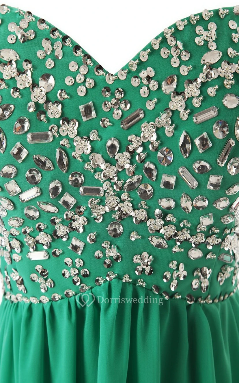 Vestido largo de gasa con escote corazón y corpiño de cristal. view 4