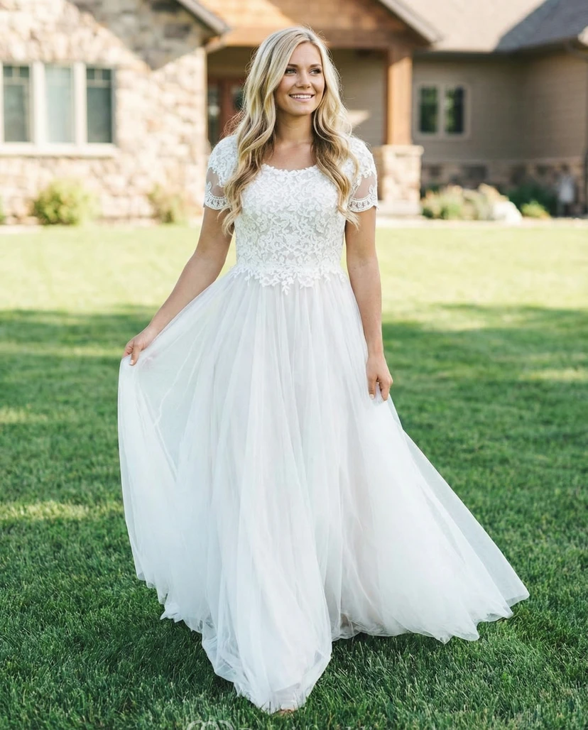 Robe de mariée bohème en tulle à manches courtes et coupe trapèze