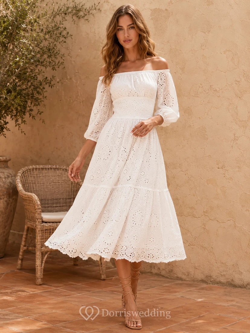Robe de mariée mi-longue à volants, épaules dénudées et manches bouffantes en dentelle