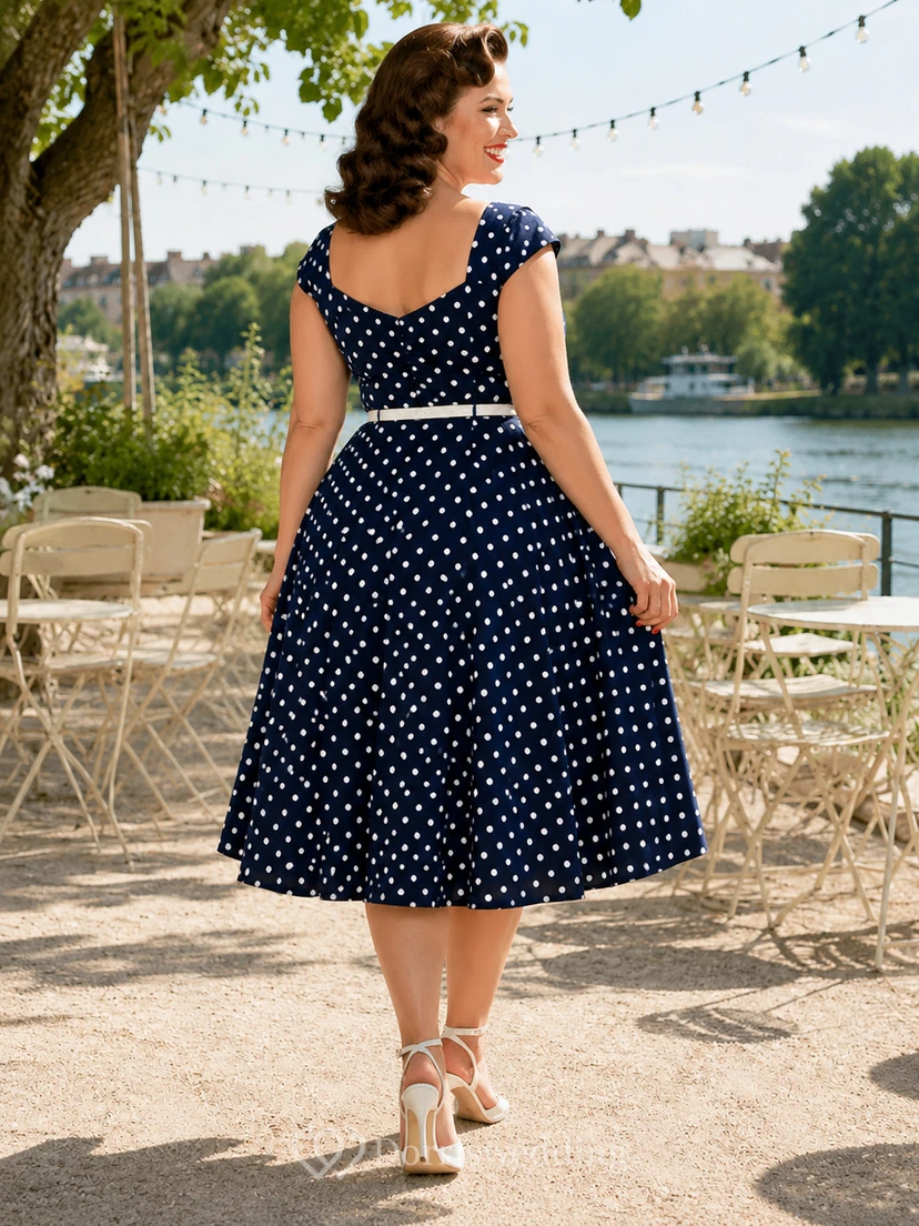 Robe cocktail grande taille vintage bleu marine à pois, décolleté cœur, manches courtes, coupe trapèze, longueur thé view 2