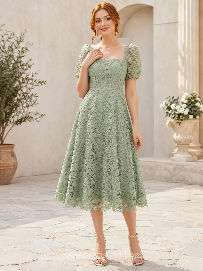 Vestido de invitada largo midi de encaje floral, cuello cuadrado, mangas abullonadas, cintura natural, corte entallado y falda acampanada, bajo festoneado.