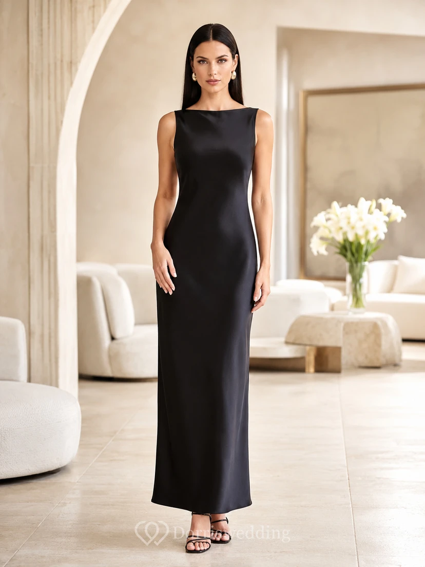 Robe de soirée élégante noire à col bateau et coupe fourreau minimaliste en satin noir, coupe fourreau.