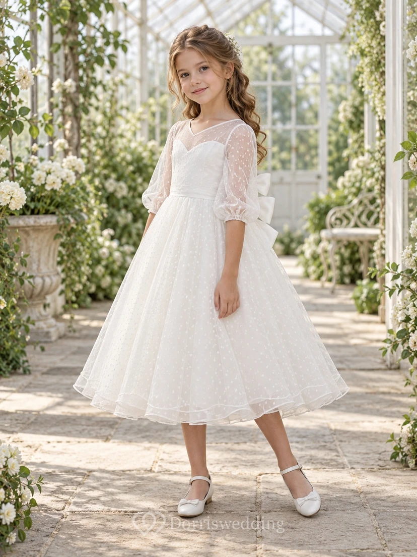 Vestido de niña de flores blanco de corte A, largo hasta la rodilla, de tul con lunares, efecto ilusión, mangas hasta el codo y doble lazo.