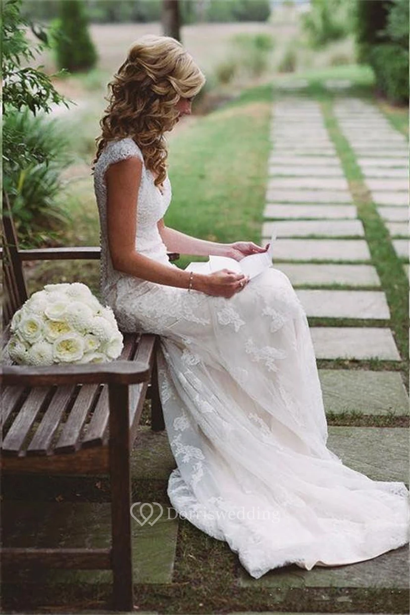 Elegantes Boho-Brautkleid mit Spitzenapplikationen, Schlüsselloch-Reißverschluss und Knopfleiste am Rücken view 3