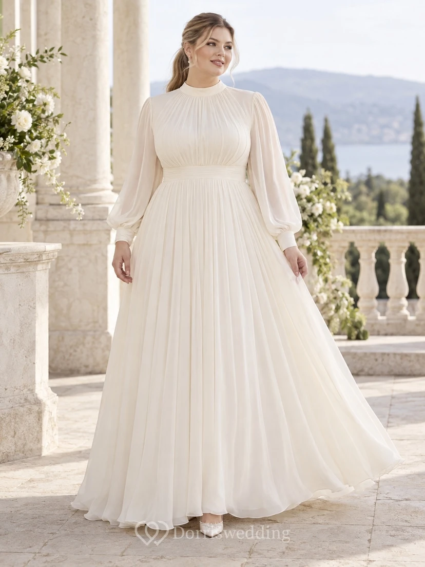 Vestido de novia de gasa de corte imperio, manga larga y cuello alto, con falda fruncida en línea A.