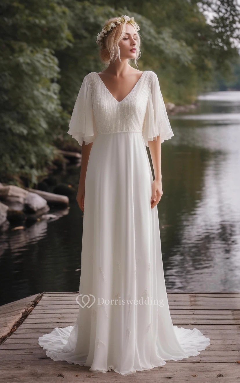 Vestido de novia de gasa con escote en V y mangas tres cuartos, estilo imperio. view 9