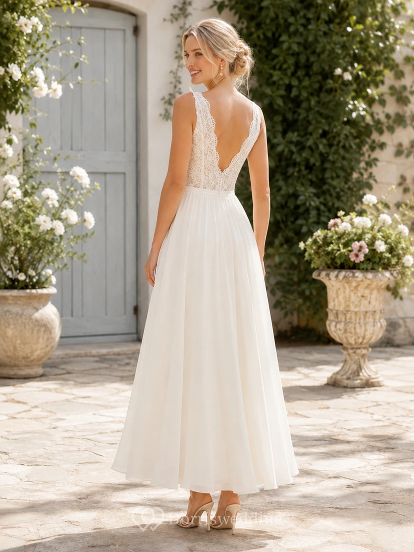 Robe de mariée vintage en dentelle et tulle, coupe trapèze, col en V, sans manches, longueur thé. view 2