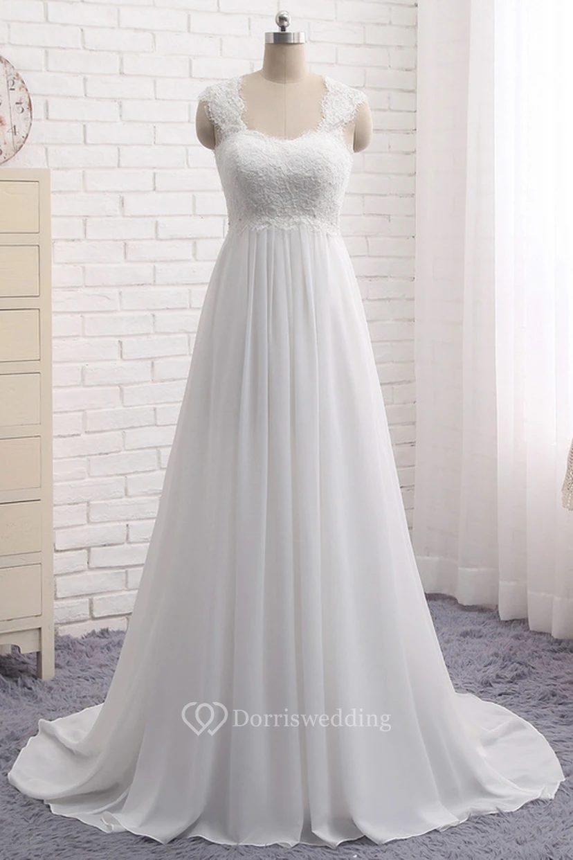 Robe de mariée élégante en mousseline de soie, coupe empire, dentelle reine Anne, avec découpe en forme de goutte et laçage.