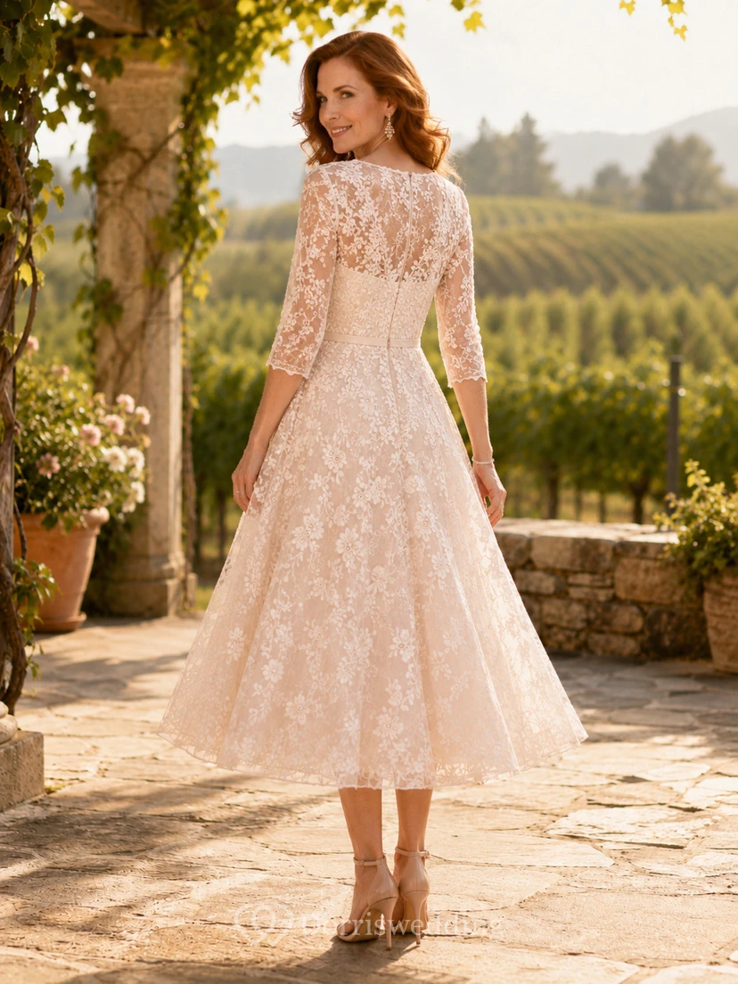 Vestido de novia vintage de encaje, corte A, cuello joya, manga corta, largo hasta la rodilla. view 2