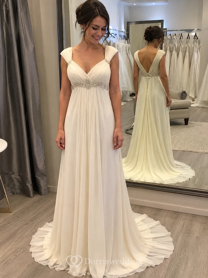 Robe de mariée de plage en mousseline de soie style empire, ornée de perles et de plis, dos nu en V et traîne. view 5