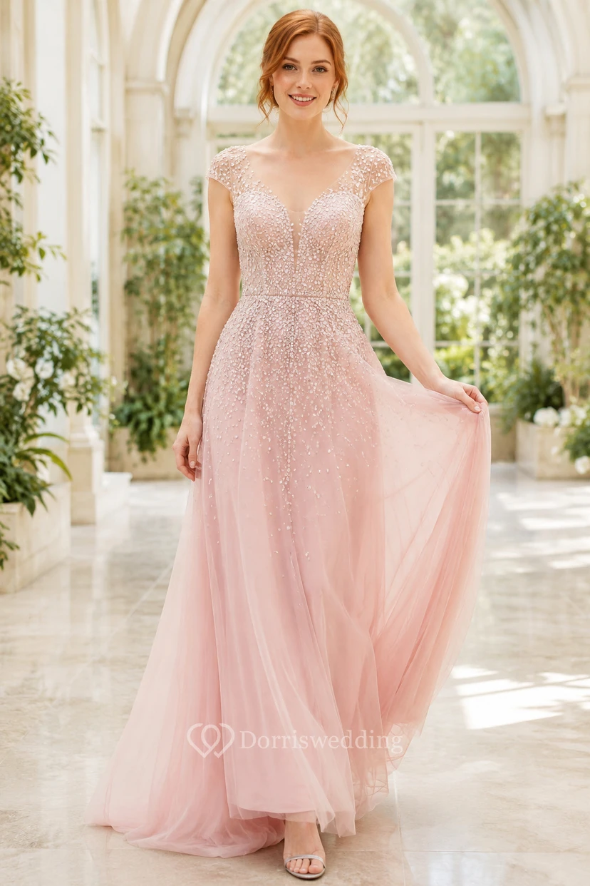 Robe de bal trapèze en tulle et corsage en dentelle rose poudré
