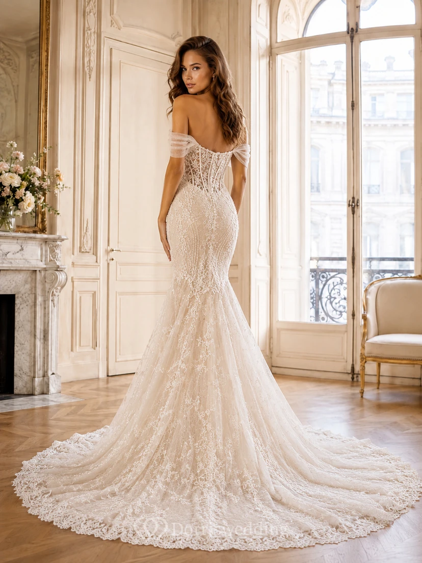 Robe de mariée sirène luxueuse en dentelle, décolleté cœur, manches courtes, traîne cathédrale, jupe amovible, idéale pour un mariage champêtre. view 2